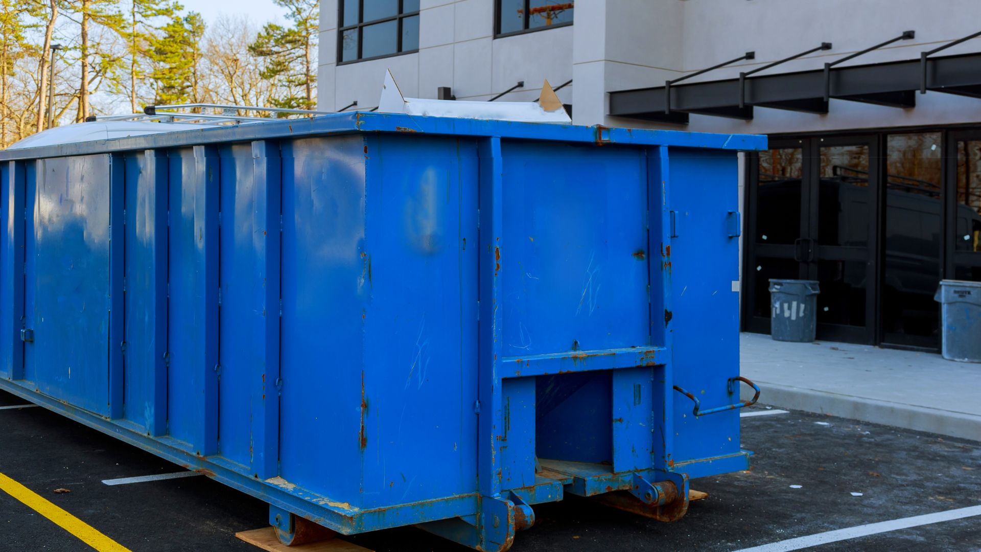Yellow Dumpster with Weight Info